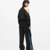 Pantaloni della tuta con pannello in denim