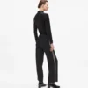 Pantaloni in maglia con dettagli bouclé Pantaloni in maglia con dettagli bouclé