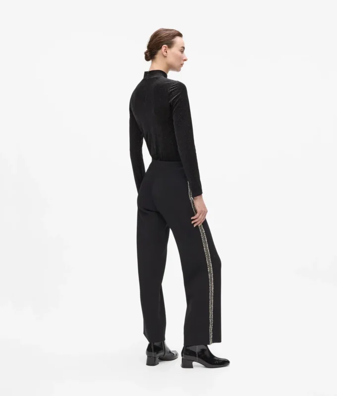 Pantaloni in maglia con dettagli bouclé Pantaloni in maglia con dettagli bouclé