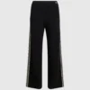 Pantaloni in maglia con dettagli bouclé Pantaloni in maglia con dettagli bouclé