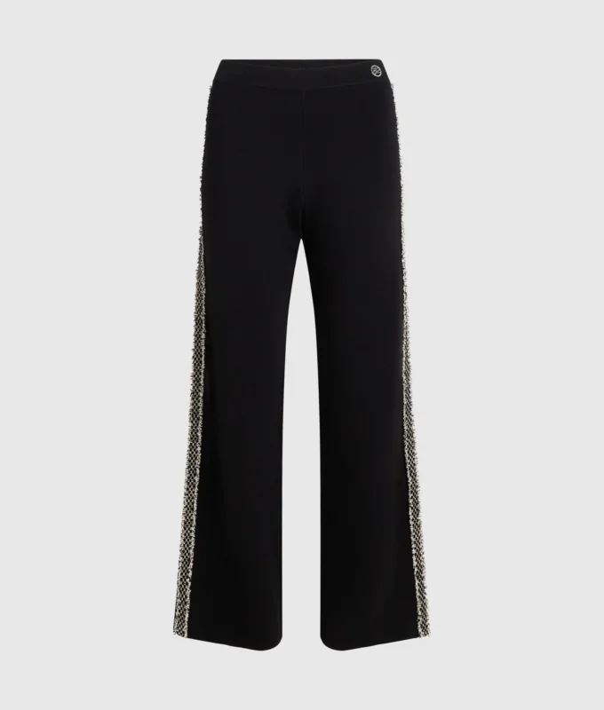 Pantaloni in maglia con dettagli bouclé Pantaloni in maglia con dettagli bouclé