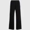 Pantaloni in maglia con dettagli bouclé Pantaloni in maglia con dettagli bouclé