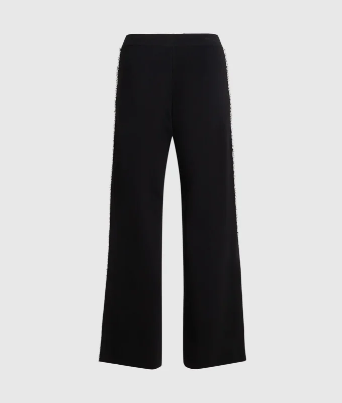 Pantaloni in maglia con dettagli bouclé Pantaloni in maglia con dettagli bouclé