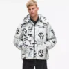 Piumino con monogramma su tutta la superficie Piumino con monogramma su tutta la superficie