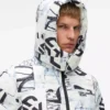 Piumino con monogramma su tutta la superficie Piumino con monogramma su tutta la superficie