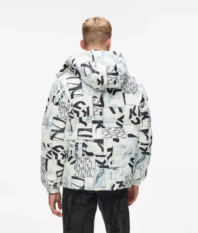 Piumino con monogramma su tutta la superficie Piumino con monogramma su tutta la superficie