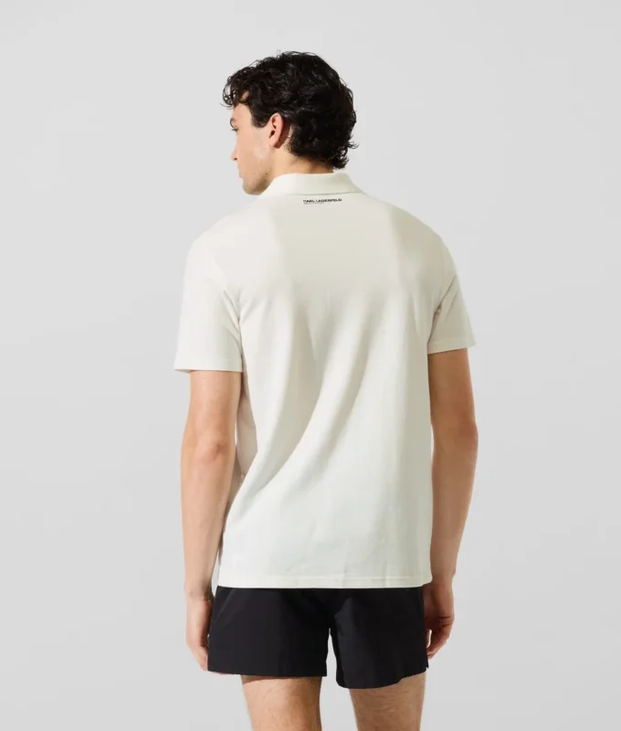 Polo con spilla Monogram