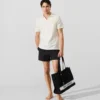 Polo con spilla Monogram