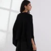 PONCHO IN MAGLIA A COSTINE PONCHO IN MAGLIA A COSTINE