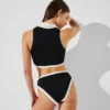 SLIP BIKINI MONOCROMATICO A VITA ALTA SLIP BIKINI MONOCROMATICO A VITA ALTA