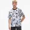 T-shirt comoda con monogramma su tutta la superficie