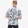 T-shirt comoda con monogramma su tutta la superficie