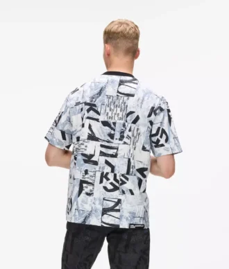 T-shirt comoda con monogramma su tutta la superficie T-shirt comoda con monogramma su tutta la superficie