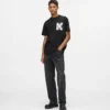 T-shirt con grafica K T-shirt con grafica K