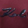 T-shirt con logo in paillettes T-shirt con logo in paillettes