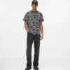 T-shirt con monogramma all-over