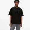 T-shirt con monogramma in paillettes T-shirt con monogramma in paillettes