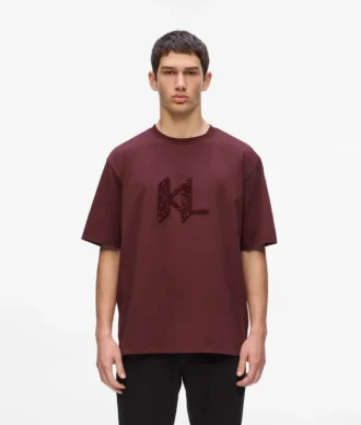 T-shirt con monogramma in paillettes