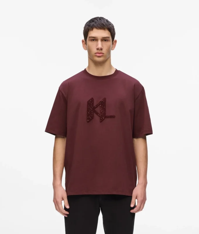 T-shirt con monogramma in paillettes T-shirt con monogramma in paillettes