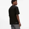 T-shirt con monogramma in paillettes T-shirt con monogramma in paillettes
