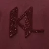 T-shirt con monogramma in paillettes T-shirt con monogramma in paillettes