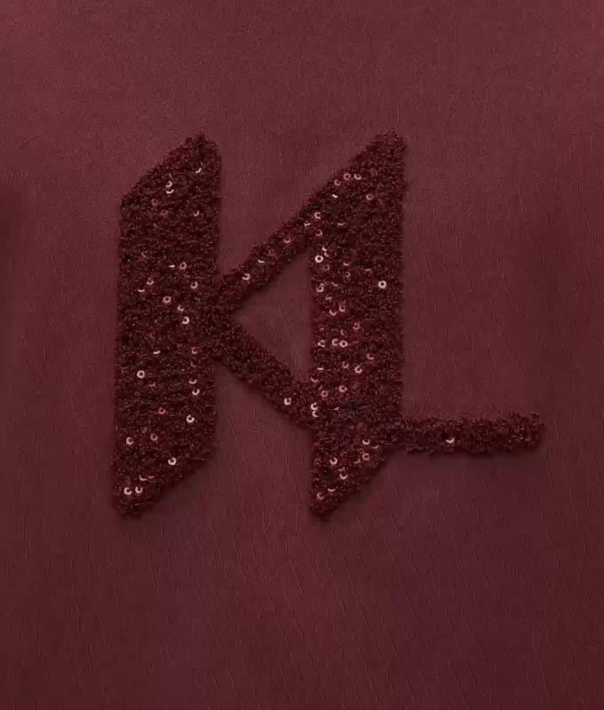 T-shirt con monogramma in paillettes T-shirt con monogramma in paillettes