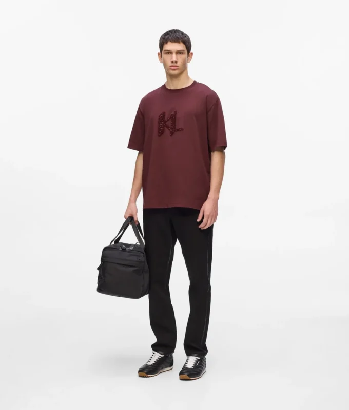 T-shirt con monogramma in paillettes T-shirt con monogramma in paillettes