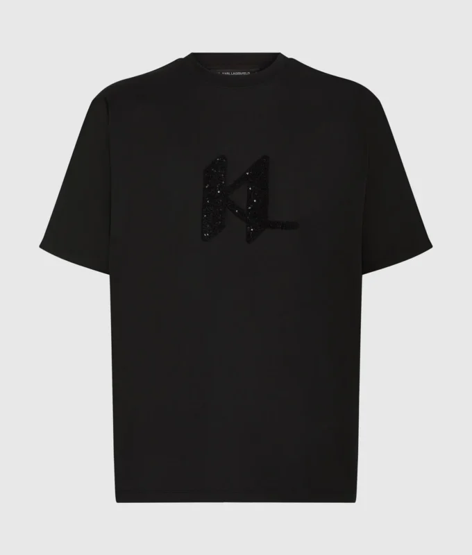 T-shirt con monogramma in paillettes T-shirt con monogramma in paillettes