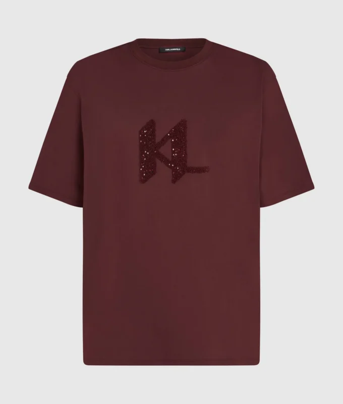 T-shirt con monogramma in paillettes T-shirt con monogramma in paillettes