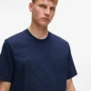 T-shirt con monogramma in rilievo T-shirt con monogramma in rilievo