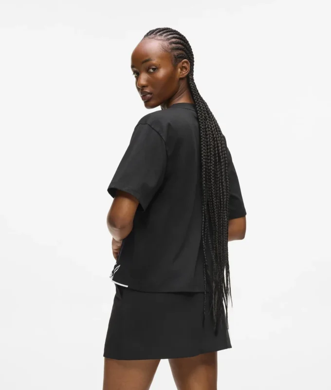 T-shirt con scollo a V e orlo caratteristico