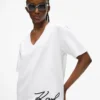 T-shirt con scollo a V e orlo caratteristico
