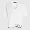 T-shirt con scollo a V e orlo caratteristico