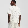 T-SHIRT CON STAMPA ALL-OVER