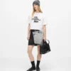 T-shirt corta con graffiti T-shirt corta con graffiti