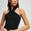TOP IN MAGLIA CON SCOLLO ALL’ALLACCIATURA TOP IN MAGLIA CON SCOLLO ALL’ALLACCIATURA