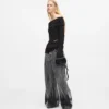 Top in maglia con spalle scoperte