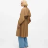 Trench con pieghe Trench con pieghe